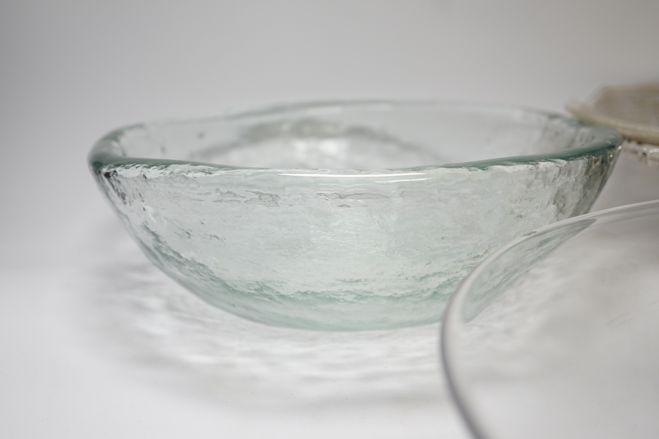 Three glass dishes, including one by Orrefors and one by A A Designs, largest 35cm in diameter